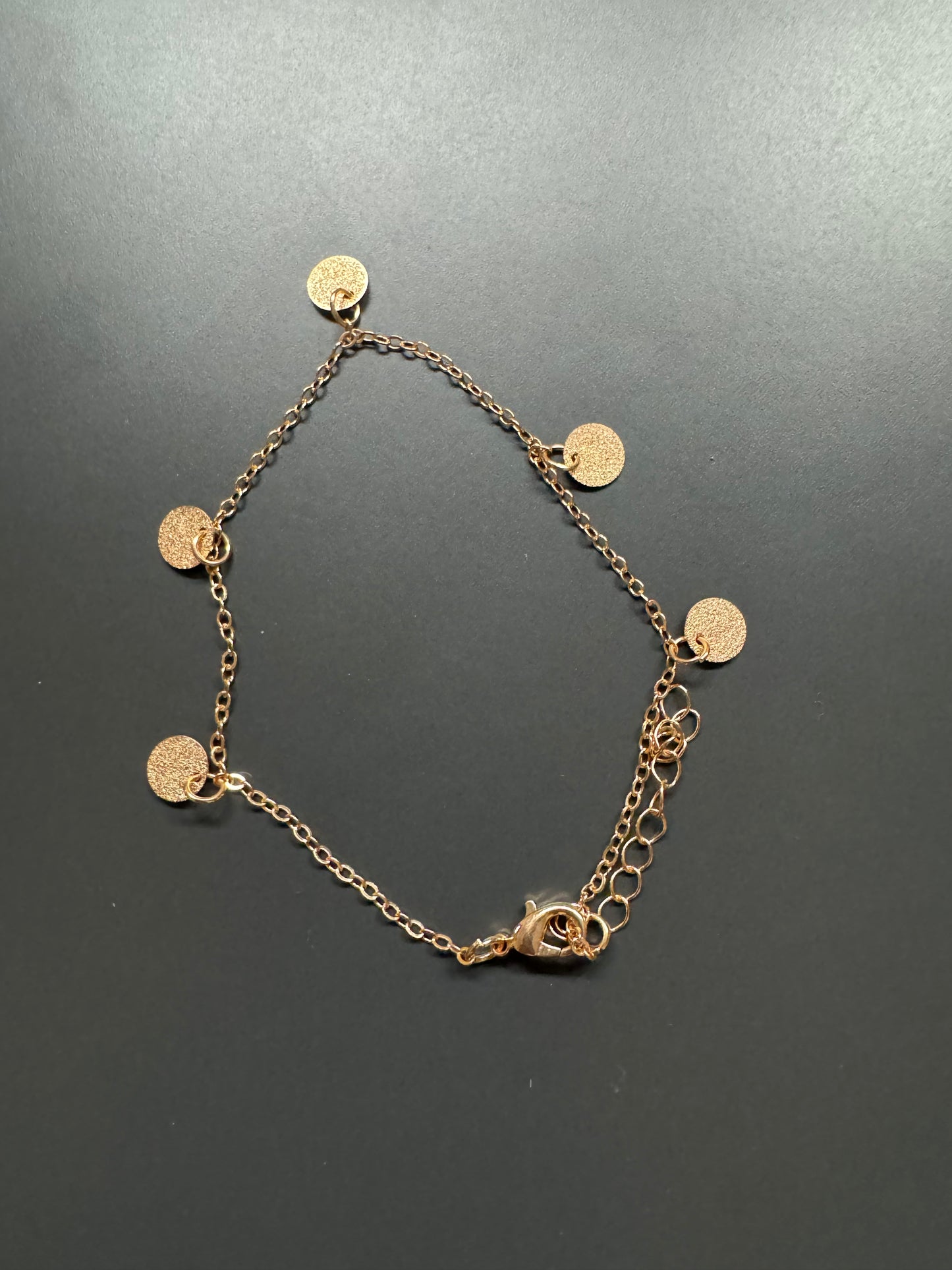 Gold chain with dangle mini medallions