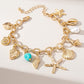 Coastal Charm Bracelet with Shells and Starfish